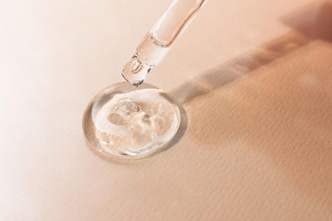 Clear hyaluronic acid gel in a minimalist skincare setting illustrating skin hydration ingredients.